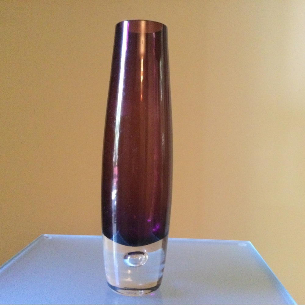 Rose taupe glass vase, approximately 11.5” tall and 3” at the widest part.